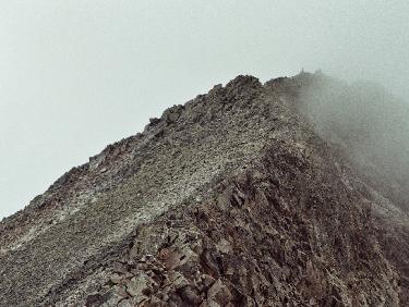 Apparition/disparition du sommet dans le brouillard