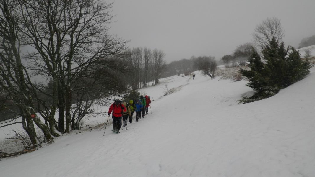 en montant