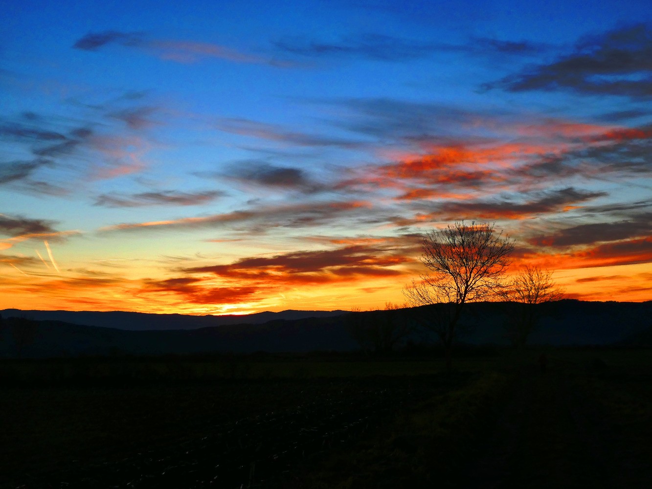Soleil couchant sur la Huche Plate